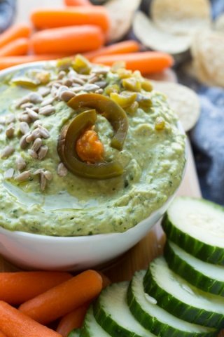 Spicy Cilantro Bean Dip (made with jalapeños and lima beans) perfect for Cinco de Mayo or any patio day this summer | ExSloth.com